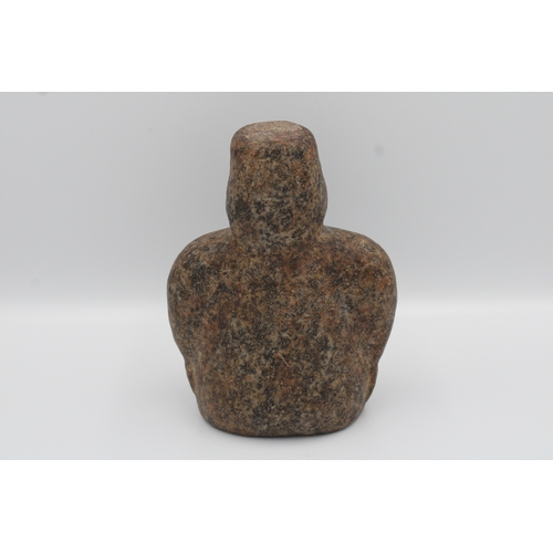 283 - Granite figurine likely originating from Central Asia.

13cm tall