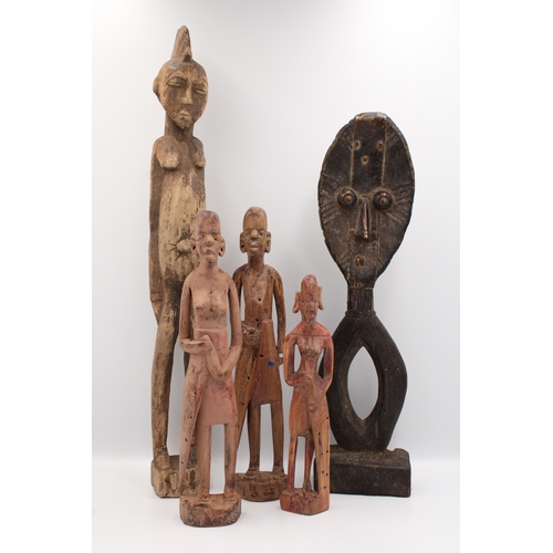 281 - Collection of five African wooden figures.

Tallest figure measures approximately 48.5 cm in length.