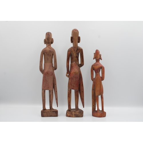 281 - Collection of five African wooden figures.

Tallest figure measures approximately 48.5 cm in length.