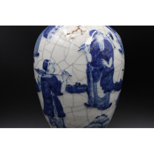 76 - Chinese blue and white crackleware vase, bearing a stamped mark on the base. It stands at a height o... 