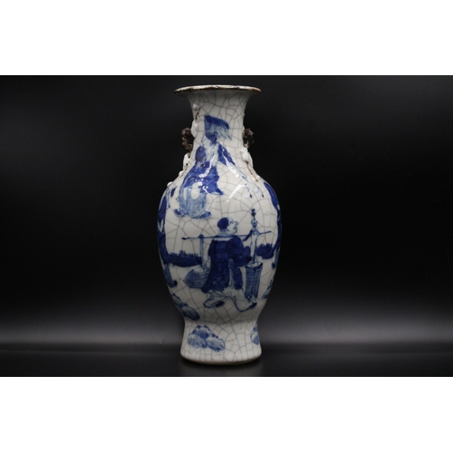 76 - Chinese blue and white crackleware vase, bearing a stamped mark on the base. It stands at a height o... 