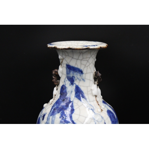 76 - Chinese blue and white crackleware vase, bearing a stamped mark on the base. It stands at a height o... 