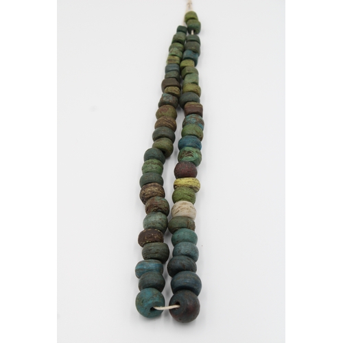 291 - Antique blue glass African necklace.

Around 31 cm long