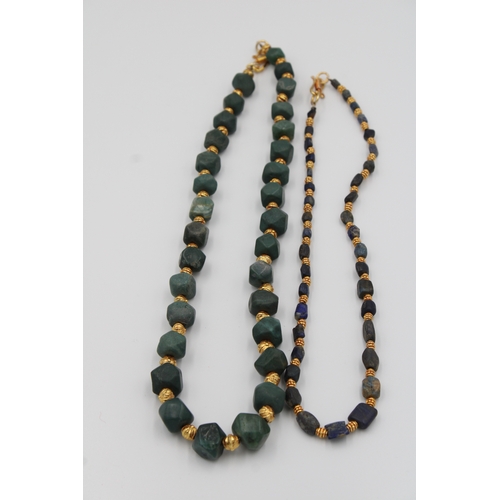 293 - Jade necklace, approximately 28 cm long, featuring exquisite shaped cutting. The smaller necklace is... 