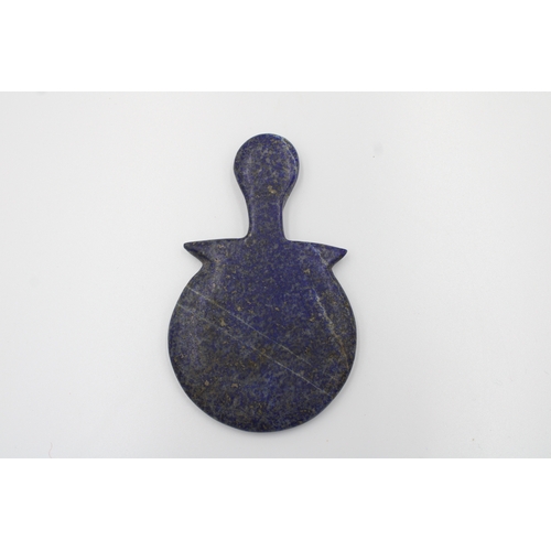 288 - Lapis Lazuli Idol in a unique circular shape. Measuring 8.5cm tall.