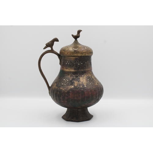 98 - 12th-century Khurasani bronze water jug adorned with Kufic calligraphy. The lid and handle feature i... 