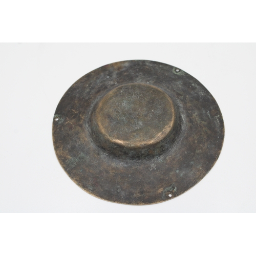 99 - Pair of 11th-century Khurasani bronze weighing scale plates, each measuring 13cm in diameter, adorne... 