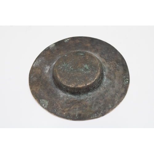 99 - Pair of 11th-century Khurasani bronze weighing scale plates, each measuring 13cm in diameter, adorne... 