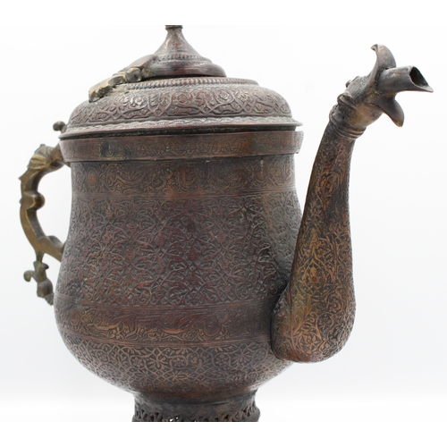 102 - A captivating 19th-century Kashmiri water samovar or kettle, crafted from copper and adorned with ex... 