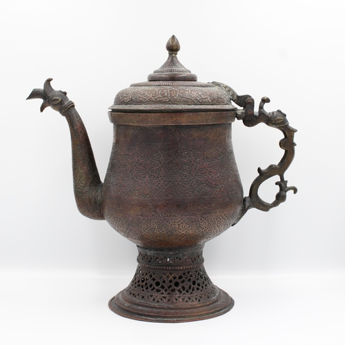 102 - A captivating 19th-century Kashmiri water samovar or kettle, crafted from copper and adorned with ex... 