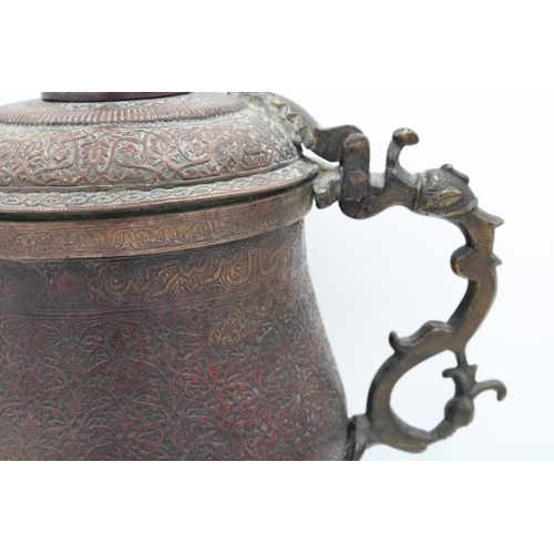 102 - A captivating 19th-century Kashmiri water samovar or kettle, crafted from copper and adorned with ex... 