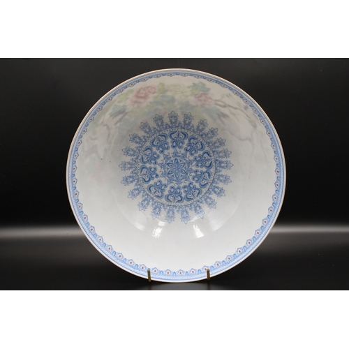 44 - A Chinese bowl, made of delicate eggshell porcelain, boasts a vibrant and captivating design. Adorne... 