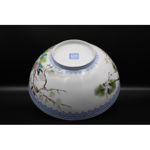 44 - A Chinese bowl, made of delicate eggshell porcelain, boasts a vibrant and captivating design. Adorne... 