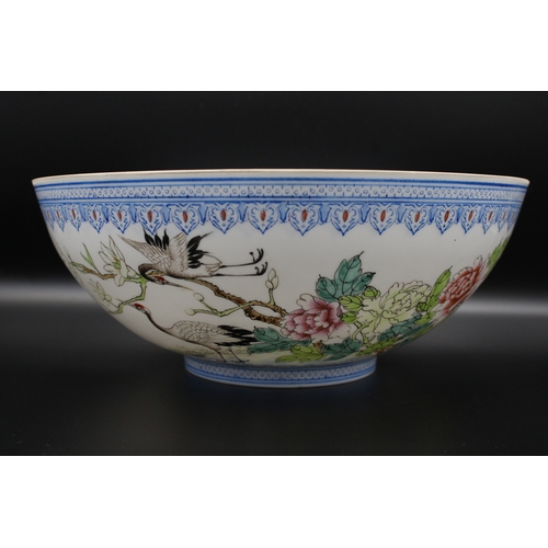 44 - A Chinese bowl, made of delicate eggshell porcelain, boasts a vibrant and captivating design. Adorne... 