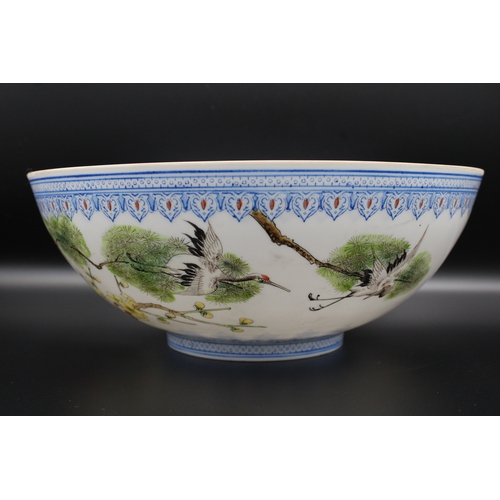 44 - A Chinese bowl, made of delicate eggshell porcelain, boasts a vibrant and captivating design. Adorne... 