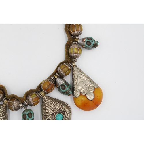 248 - Tibetan Necklace: White Metal, Turquoise, Amber colour stones, Symbolic Skull Decor.