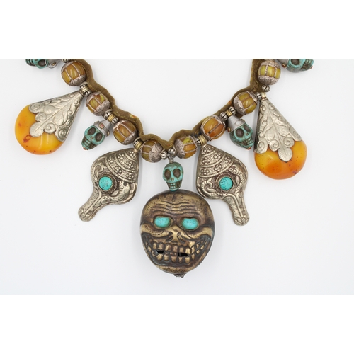 248 - Tibetan Necklace: White Metal, Turquoise, Amber colour stones, Symbolic Skull Decor.