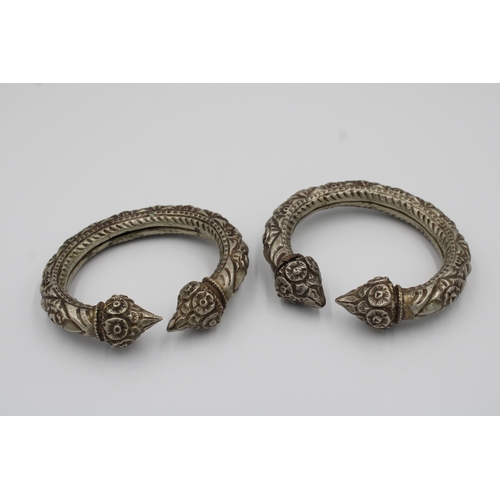 249 - Pair of Indian Silver Tribal Bangles.