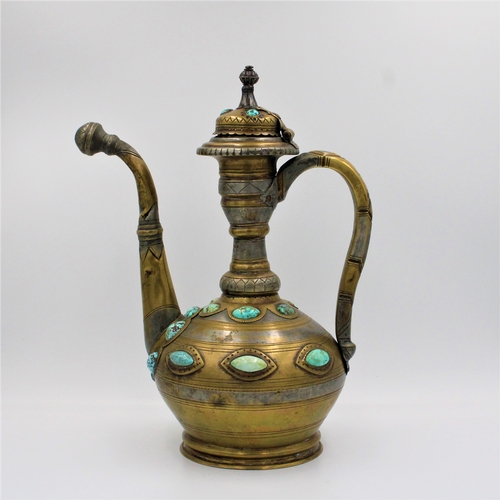 104 - This is an Islamic Bukhara bronze jug and water collector, likely used for handwashing. It is adorne... 