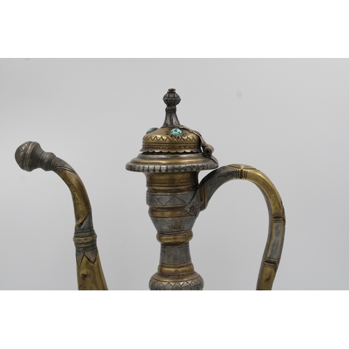 104 - This is an Islamic Bukhara bronze jug and water collector, likely used for handwashing. It is adorne... 