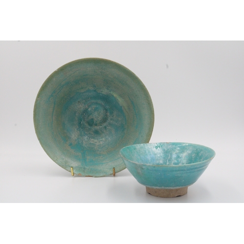 114 - Here we have a captivating pair of Islamic 12th-century ceramic pieces in stunning shades of turquoi... 