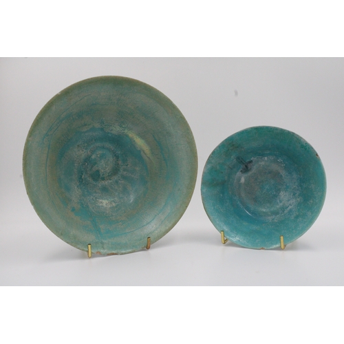 114 - Here we have a captivating pair of Islamic 12th-century ceramic pieces in stunning shades of turquoi... 