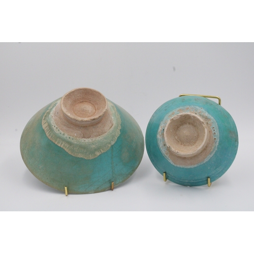 114 - Here we have a captivating pair of Islamic 12th-century ceramic pieces in stunning shades of turquoi... 