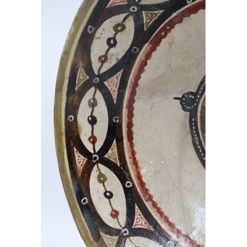 117 - This 12th-century pottery bowl hails from Nishapur and is exquisitely glazed. Its surface is adorned... 