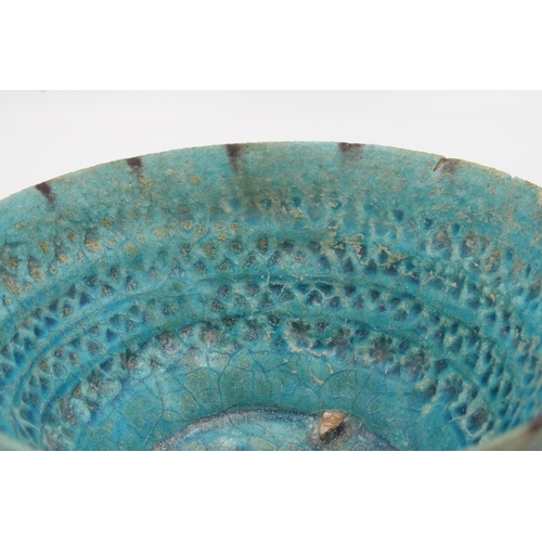 119 - This 12th-century Kashan ware bowl, resplendent in its turquoise glaze, is in remarkable condition. ... 