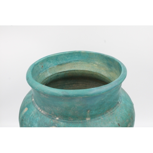 121 - This exquisite turquoise vase hails from Nishapur and dates back to the 12th century. While it has u... 