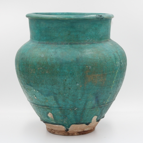 121 - This exquisite turquoise vase hails from Nishapur and dates back to the 12th century. While it has u... 