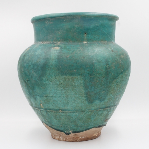 121 - This exquisite turquoise vase hails from Nishapur and dates back to the 12th century. While it has u... 