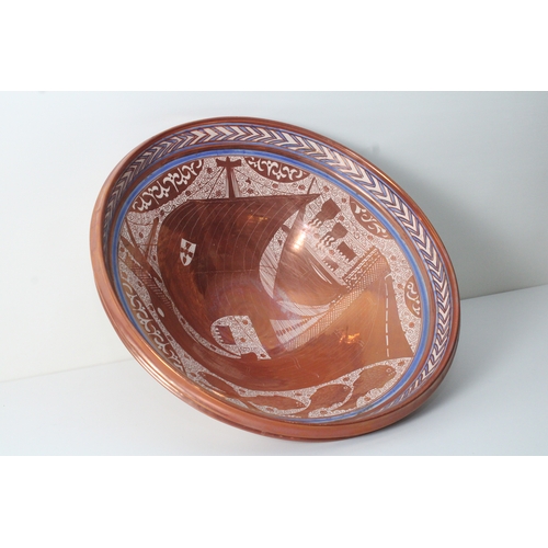 305 - Introducing our exquisite Spanish large plate, crafted from lustrous ceramic in a stunning orange/go... 