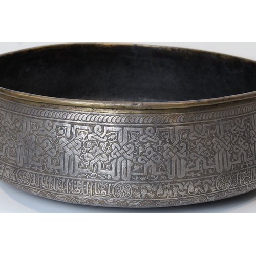 107 - Introducing a stunning large copper bowl, measuring 62cm in diameter, adorned with intricate silver ... 