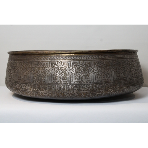 107 - Introducing a stunning large copper bowl, measuring 62cm in diameter, adorned with intricate silver ... 