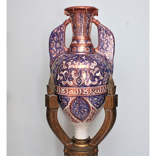 126 - This grand 19th-century Islamic Hispano pottery vase, exquisitely designed in the Alhambra style, st... 