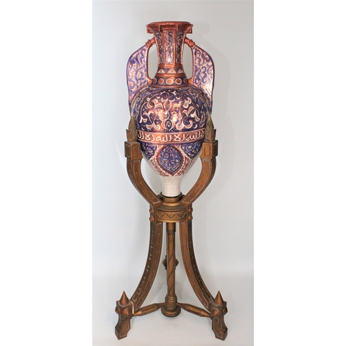 126 - This grand 19th-century Islamic Hispano pottery vase, exquisitely designed in the Alhambra style, st... 