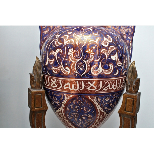 126 - This grand 19th-century Islamic Hispano pottery vase, exquisitely designed in the Alhambra style, st... 