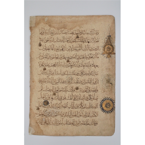 22 - A remarkable leaf is a fragment from a Mamluk Qur'an, featuring a total of 12 lines of beautifully p... 