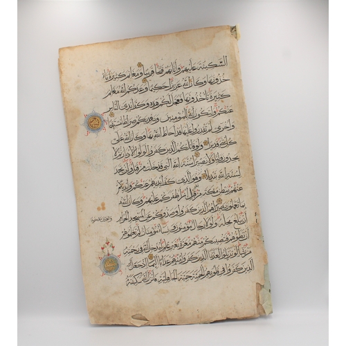 27 - This pair of leaves, originating from a Mamluk Qur'an, offers a glimpse into the rich history of Isl... 