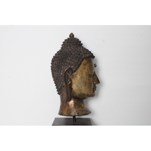 31 - Chinese Tibetan Gilt Buddha Head with Curled Hair: This Tibetan gilt Buddha head, displaying beautif... 