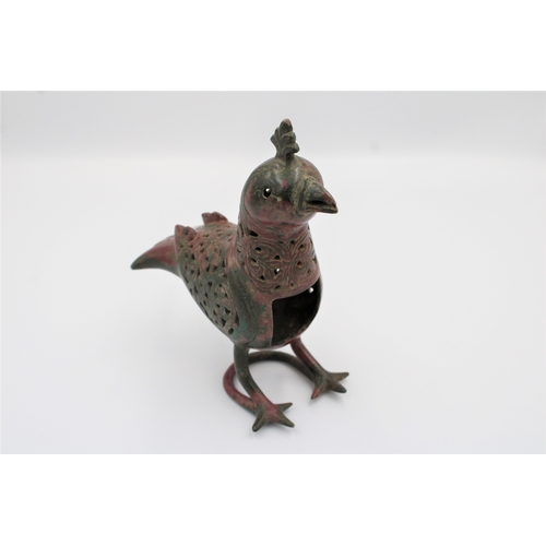 127 - RARE Seljuk Bronze Bird Incense Burner: Behold this remarkable Seljuk bronze bird incense burner, a ... 