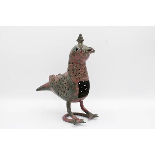 127 - RARE Seljuk Bronze Bird Incense Burner: Behold this remarkable Seljuk bronze bird incense burner, a ... 