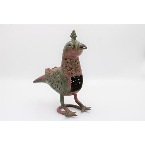 127 - RARE Seljuk Bronze Bird Incense Burner: Behold this remarkable Seljuk bronze bird incense burner, a ... 