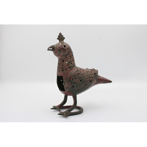 127 - RARE Seljuk Bronze Bird Incense Burner: Behold this remarkable Seljuk bronze bird incense burner, a ... 