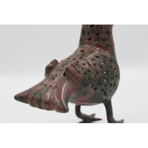 127 - RARE Seljuk Bronze Bird Incense Burner: Behold this remarkable Seljuk bronze bird incense burner, a ... 