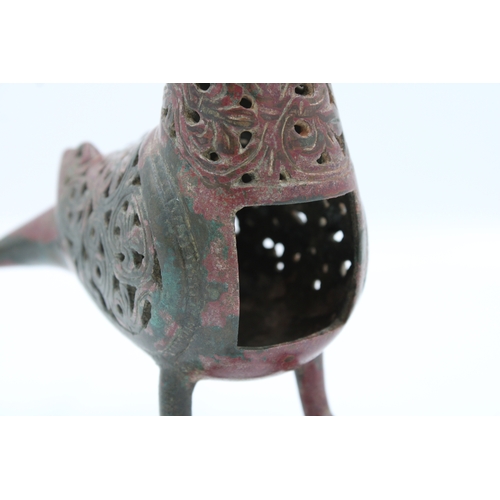 127 - RARE Seljuk Bronze Bird Incense Burner: Behold this remarkable Seljuk bronze bird incense burner, a ... 