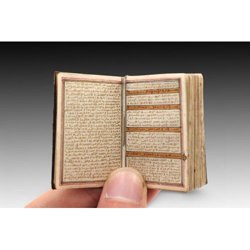 1 - An Islamic Miniature Quran written in 1199 by Fatimah bint Ustad Yahya Helmy with a Silver Case

Hei... 