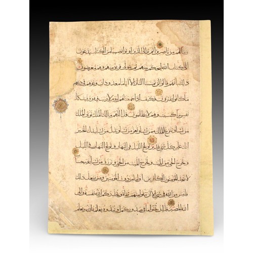 11 - An Islamic leaf from a Mamluk Qur'an with 11 Sacred Quranic Lines.

Height: Approximately 45.7cm
Len... 