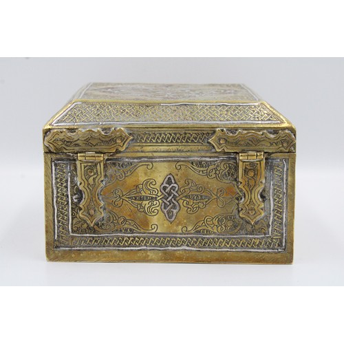 19 - An Islamic Egyptian Brass Box with Silver Inlay and Wooden Inside

Height: Approximately 8.2cm
Lengt... 